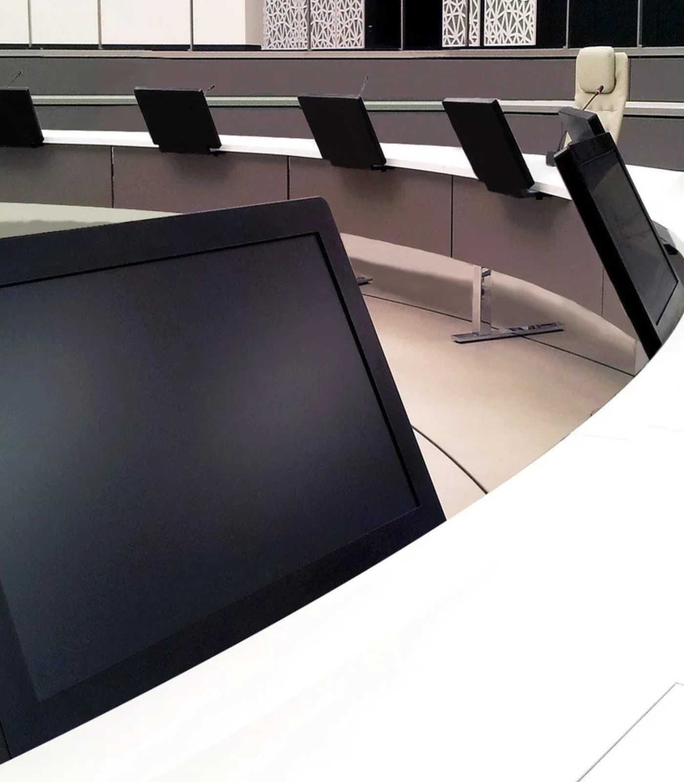 Modern desk monitor in a congress room