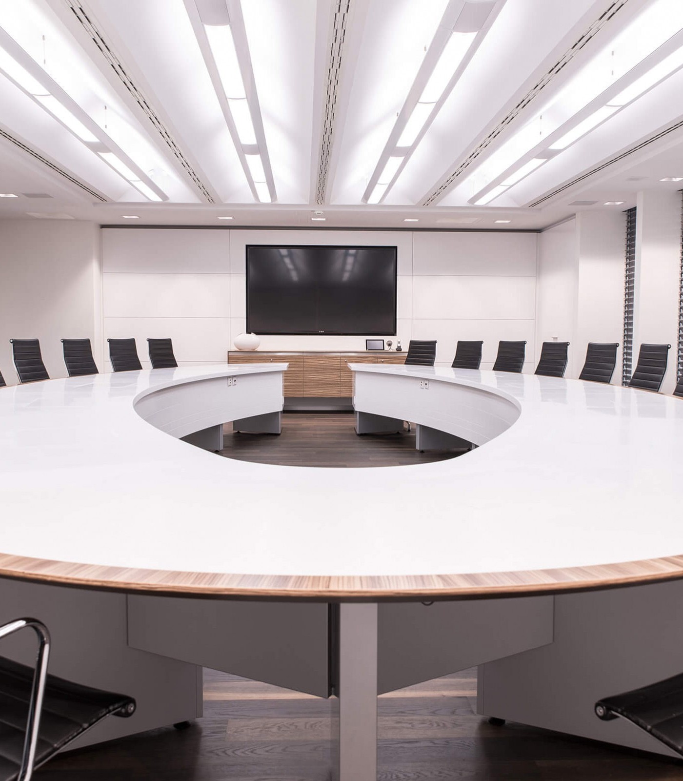 Noll integrates in-table monitors from Novis in the conference table