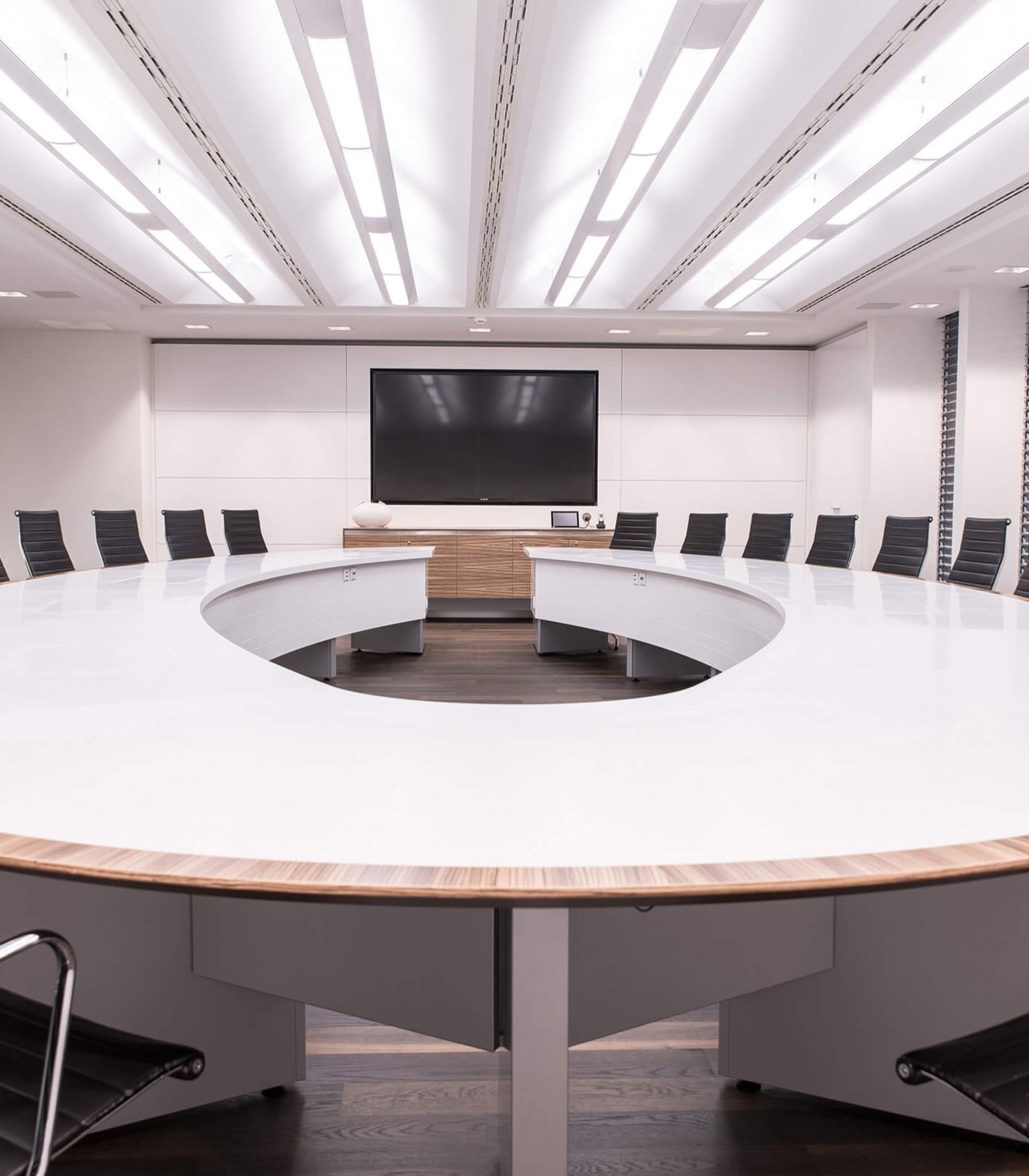 Noll integrates in-table monitors from Novis in the conference table