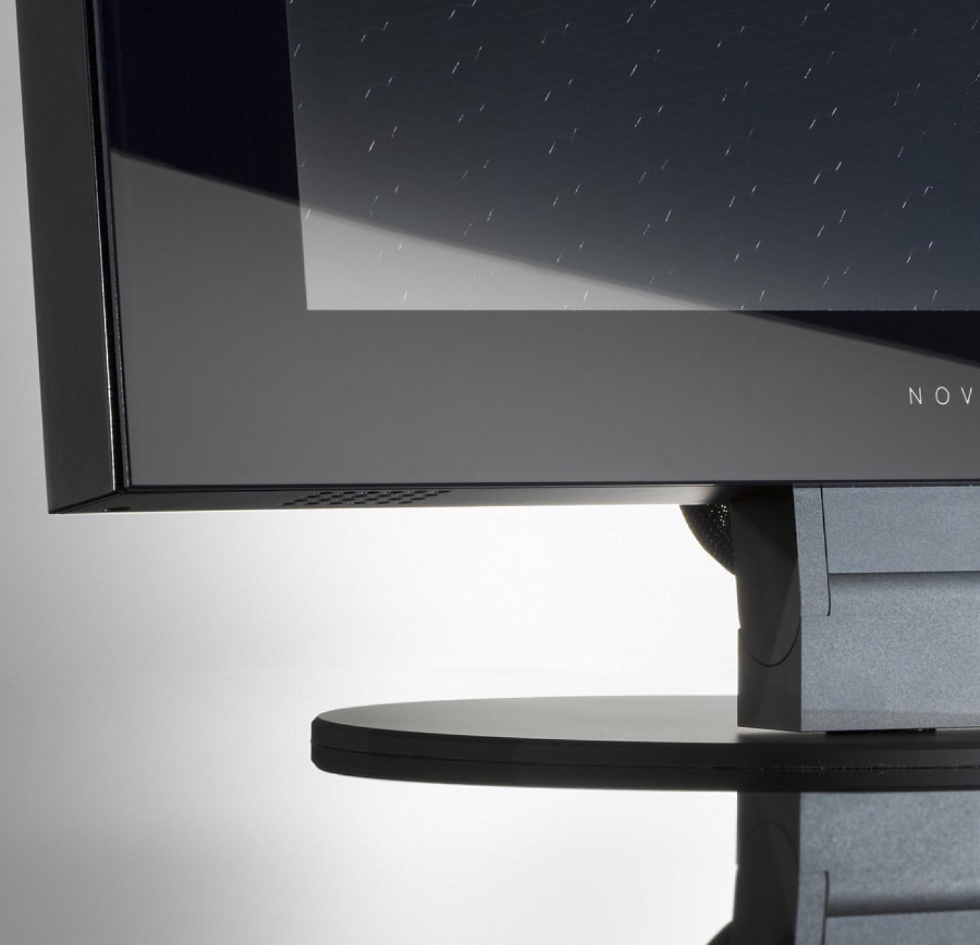 Detail picture of the LOFT desktop design monitor. Black anodized aluminum