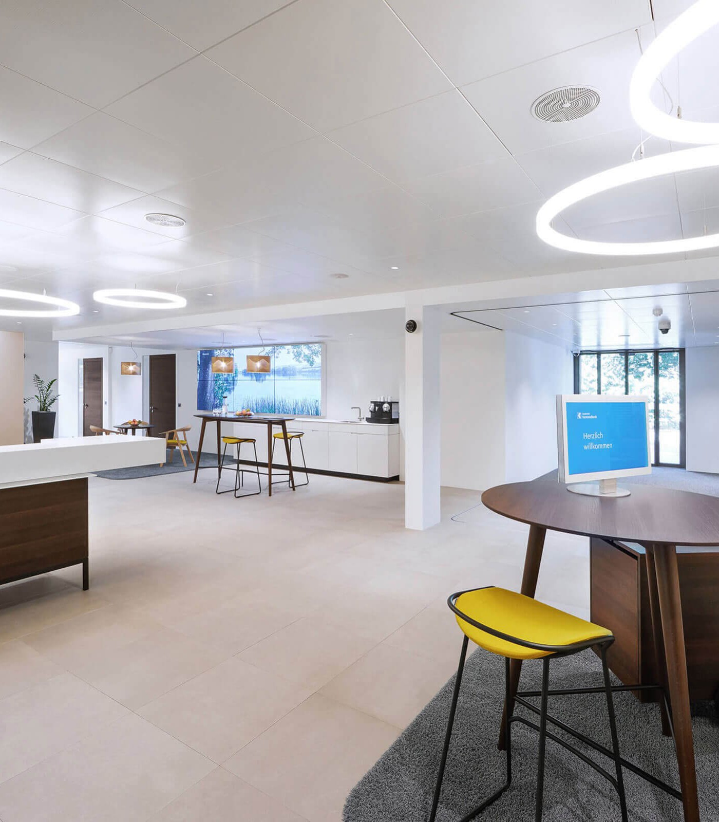 on reception desks or learning tables you see white design monitors of Novis