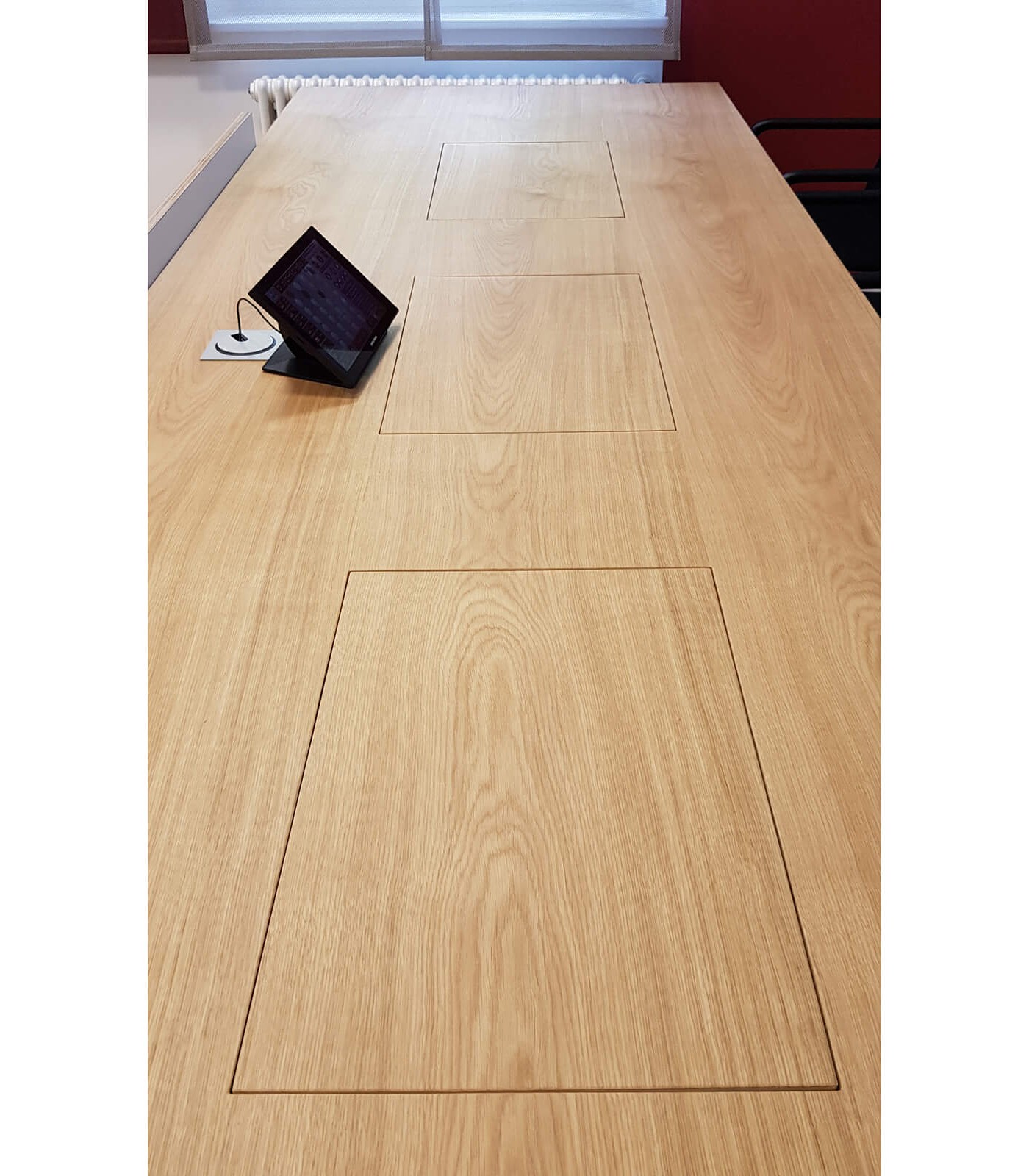 Foldable table-top monitors from Novis in table veneer oak