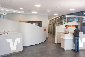 Welcome and service desk with design panels in white flat installed