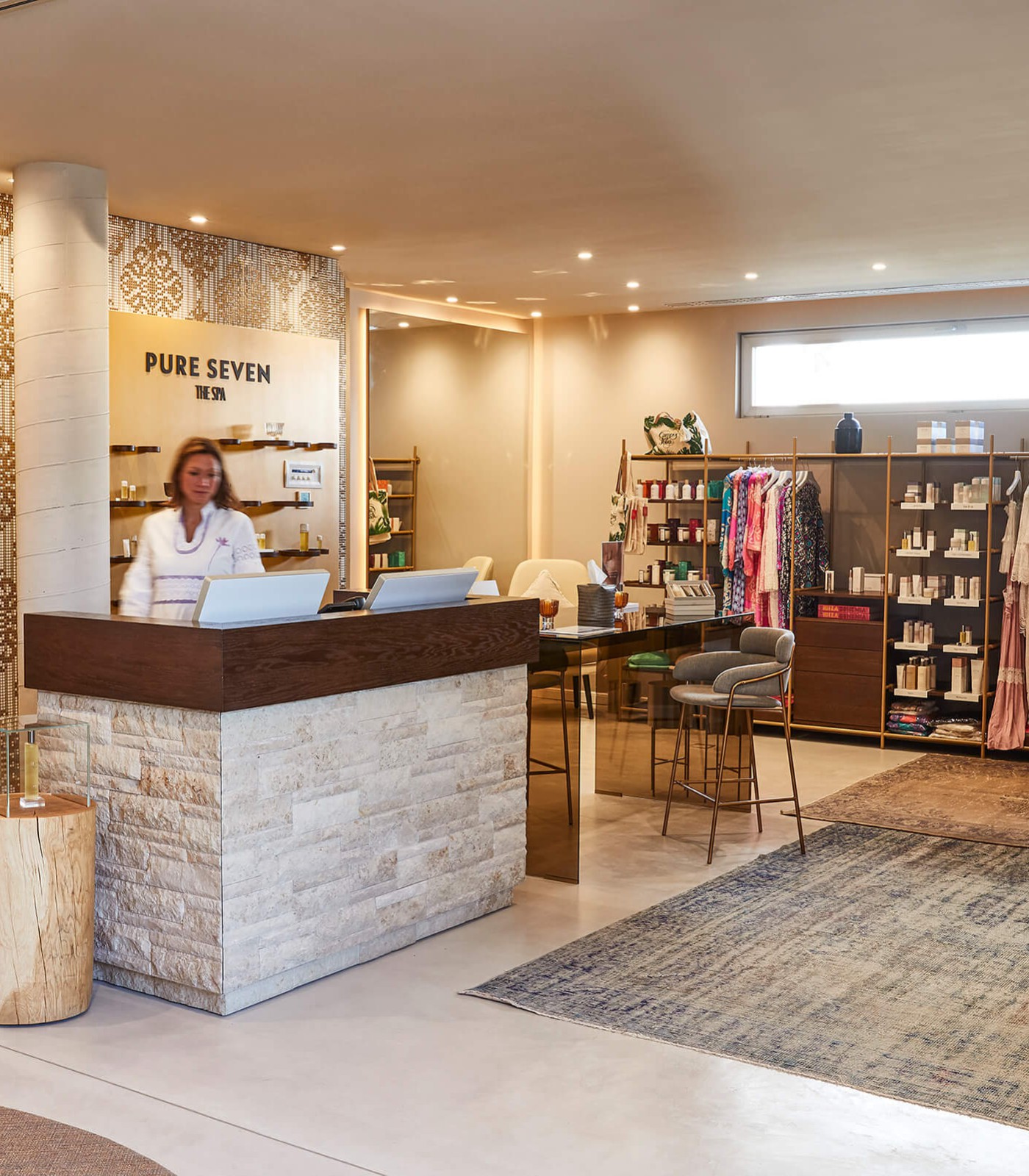 The 7 Pines Hotel Shop in Ibiza. The FLO EVO Design Monitor welcomes guests with its understated white finish