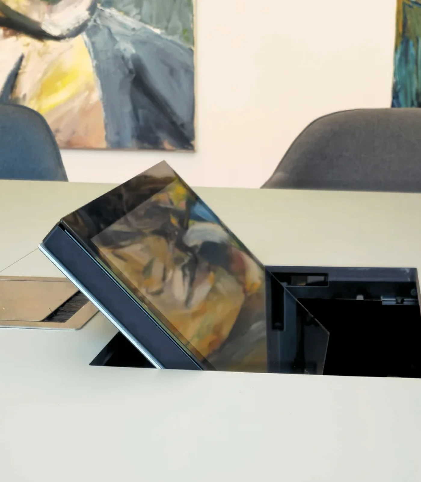 Close-up of a retractable and foldable monitor for notarial certification